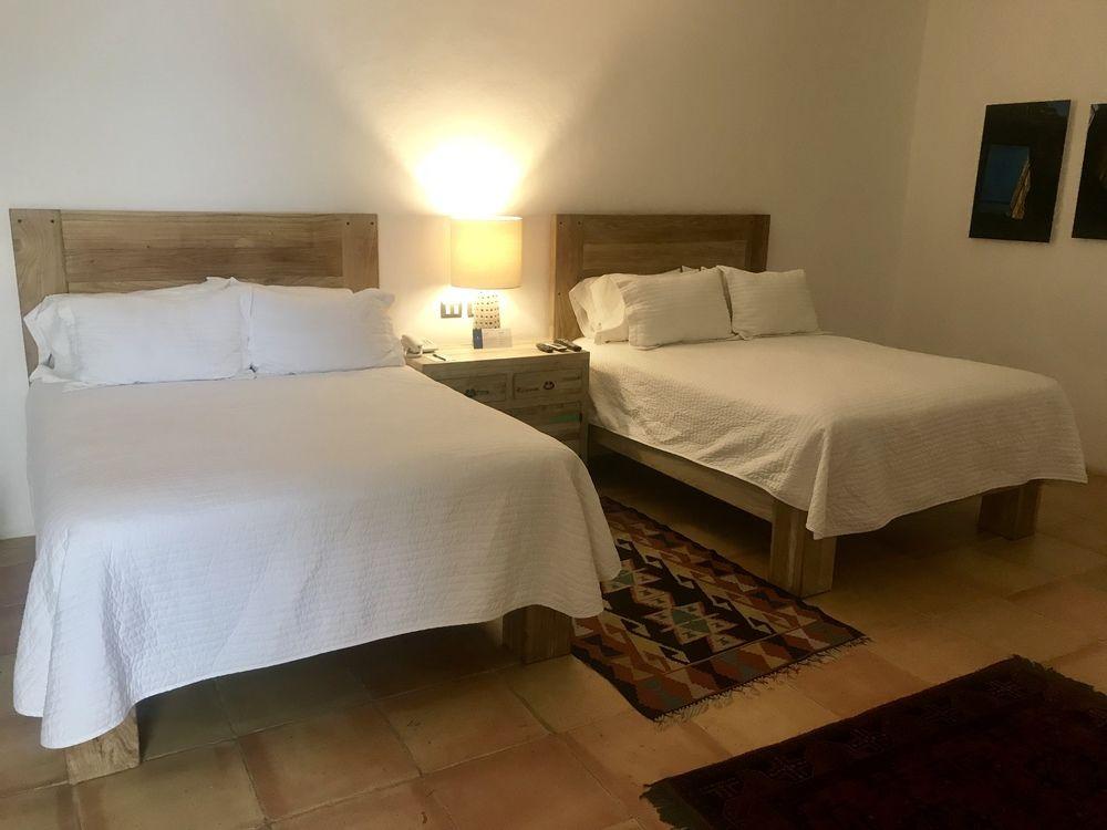 Hotel Boutique Casareyna Puebla Kültér fotó A guest room at the Inn at the Quinta de San Lucas
