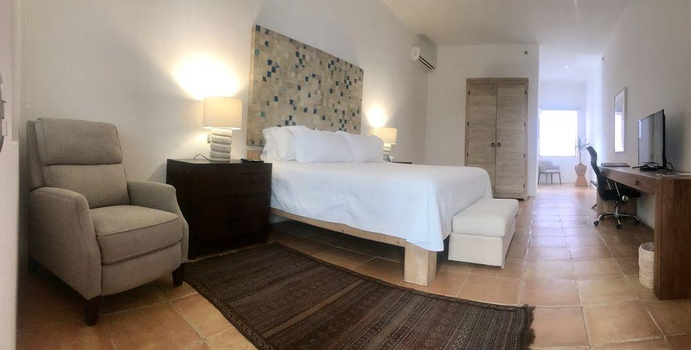 Hotel Boutique Casareyna Puebla Kültér fotó A bedroom at the hotel