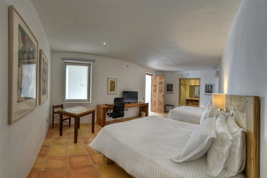 Hotel Boutique Casareyna Puebla Kültér fotó A room at the hotel